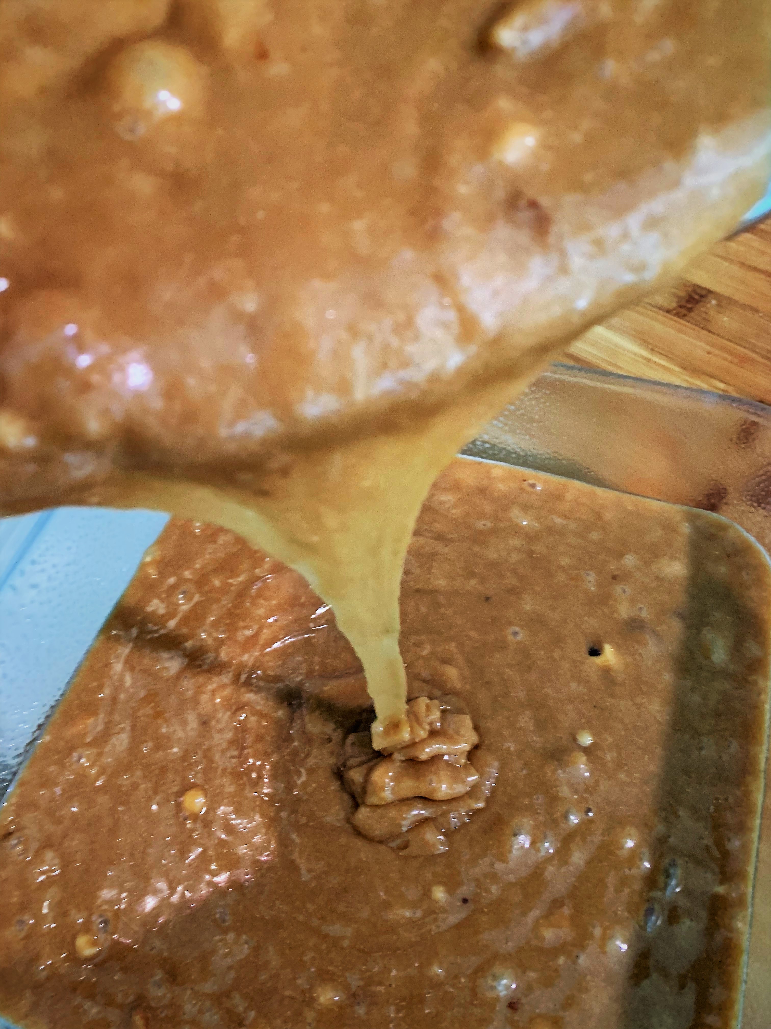 Pouring the batter into the baking pan - Peanut Butter Blondies - Disney Cruise Line