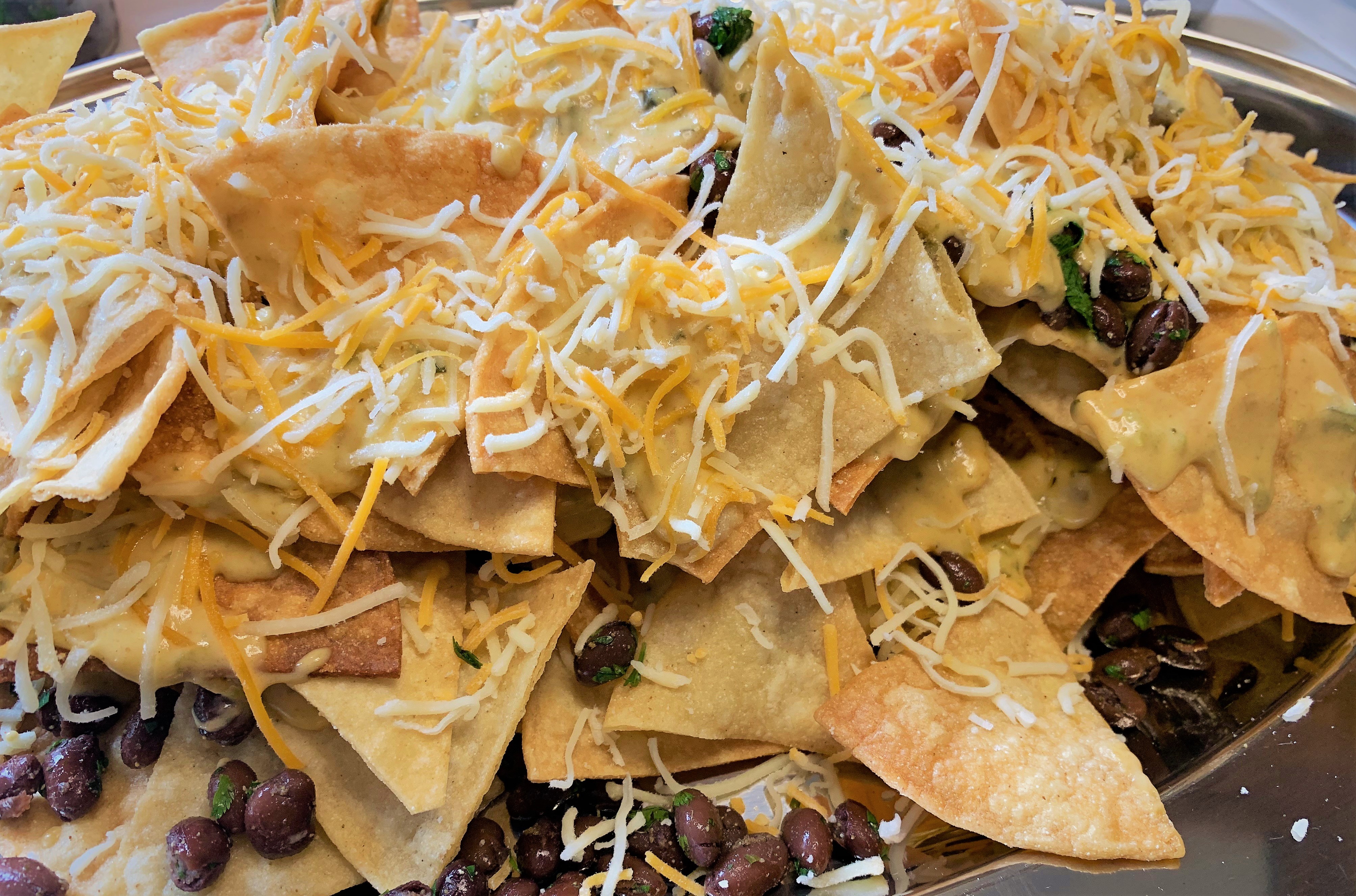 Assembling the layers of our Lobster Nachos