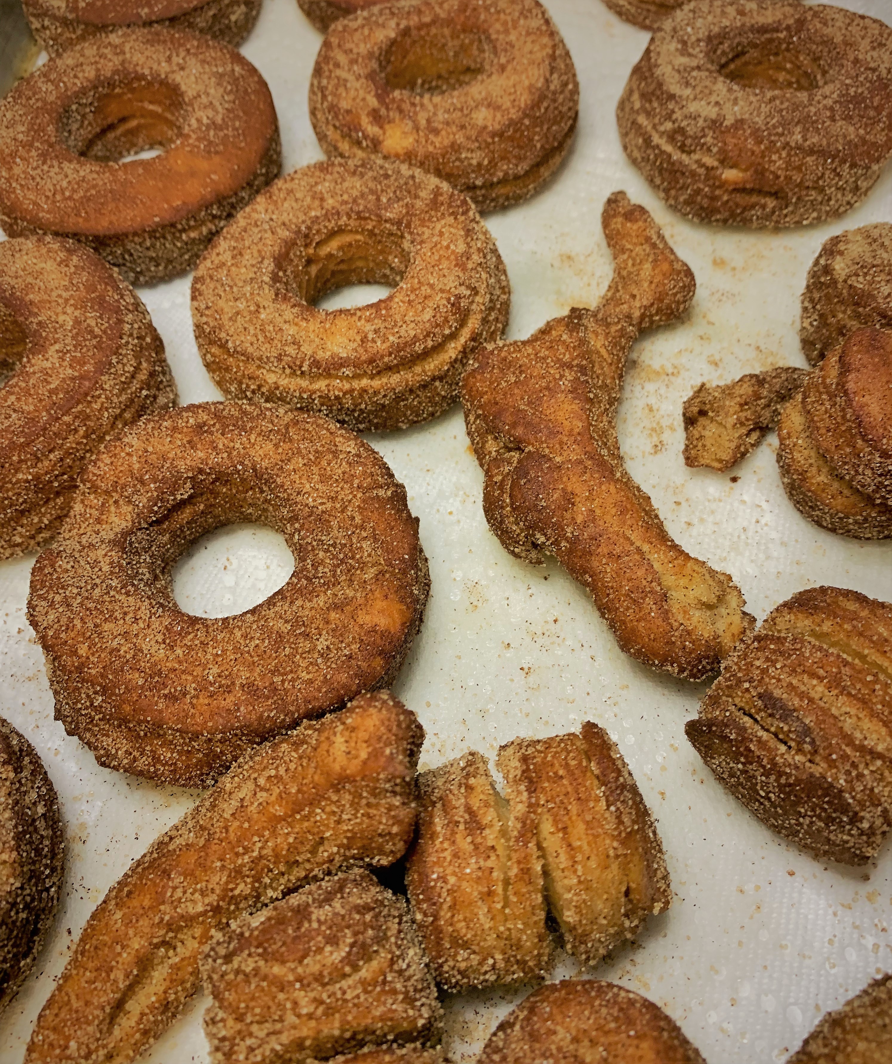 Our cooked and coated Croissant Doughnuts