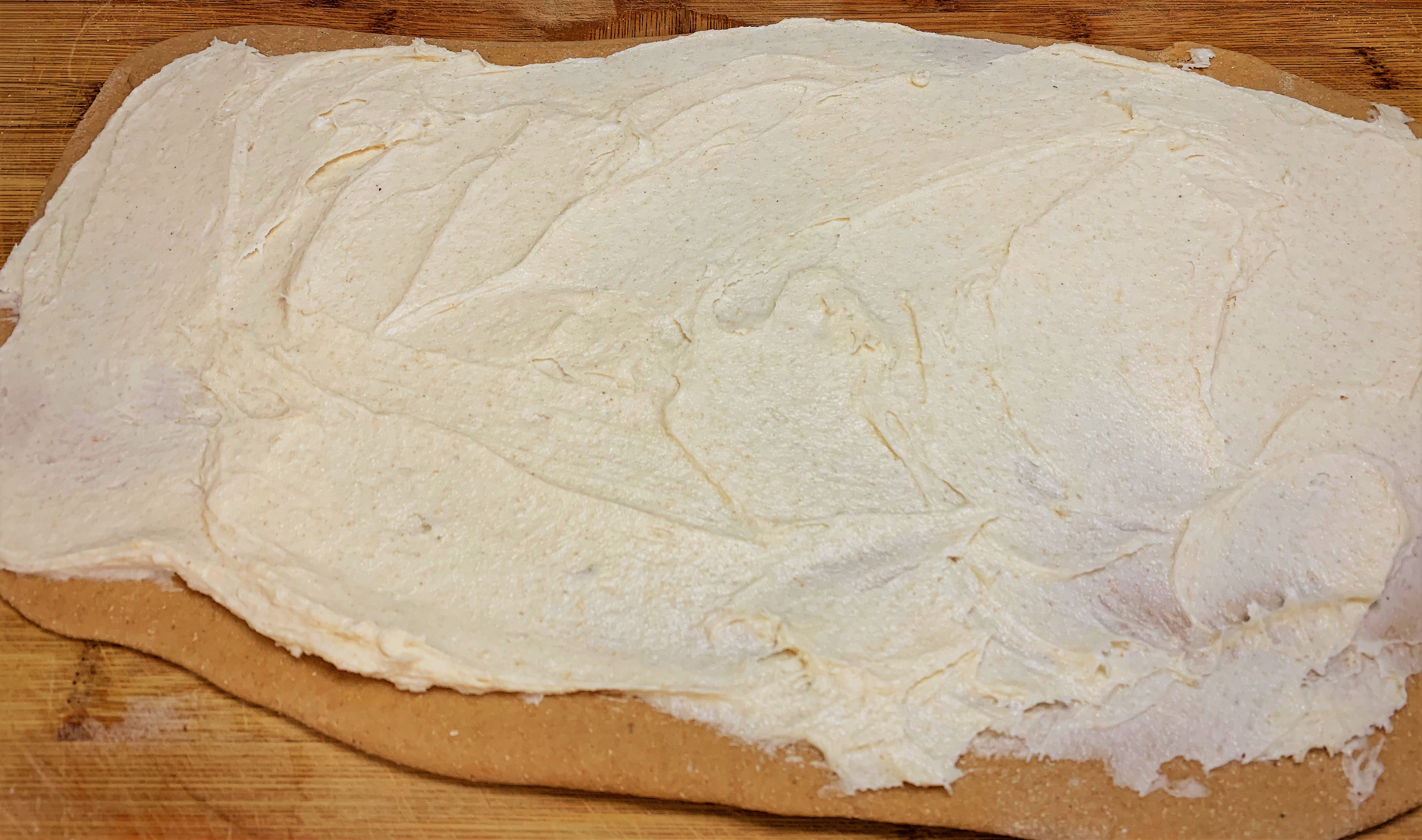 Adding the butter to our dough