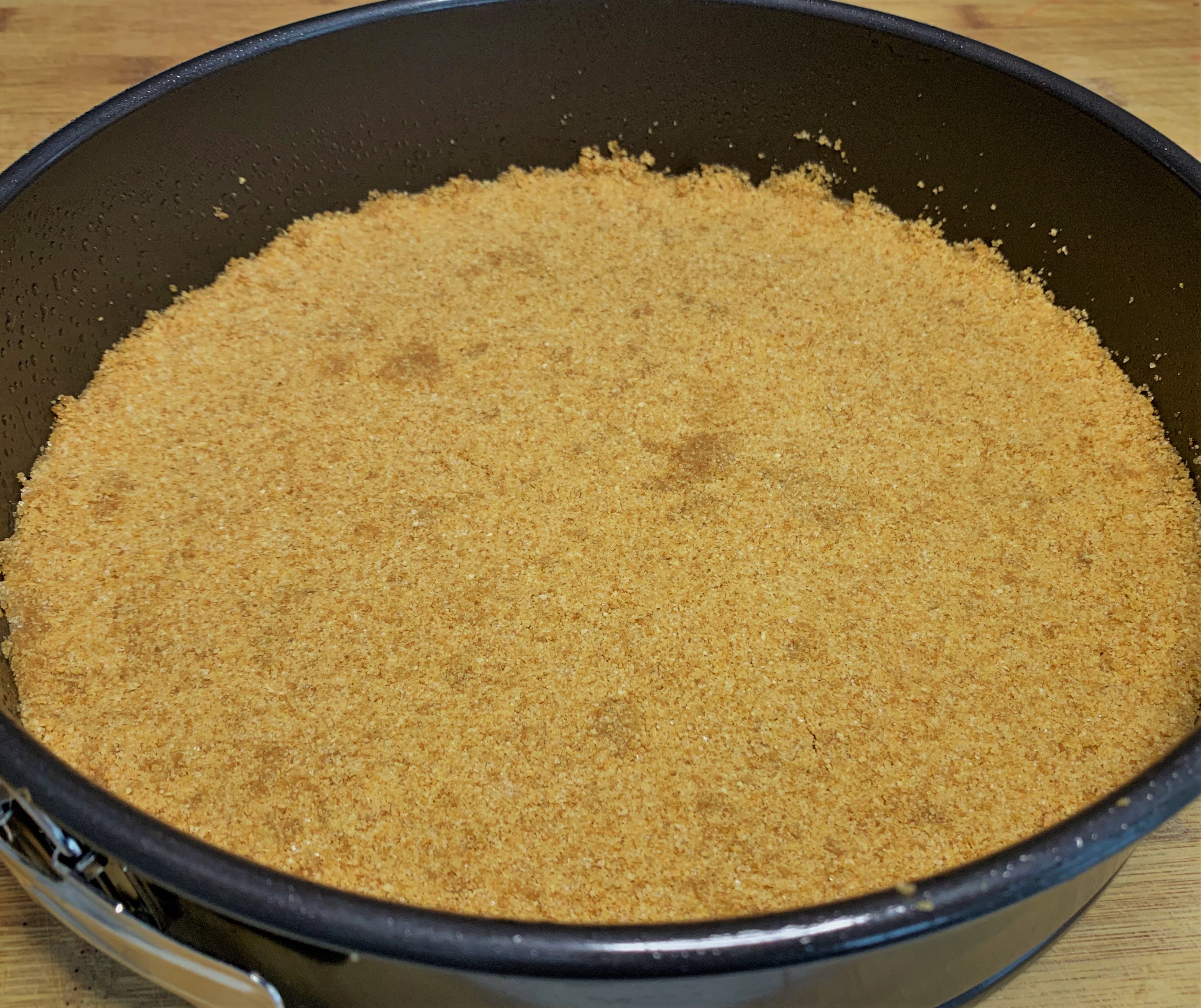 The crumb crust pressed into the base of our pan