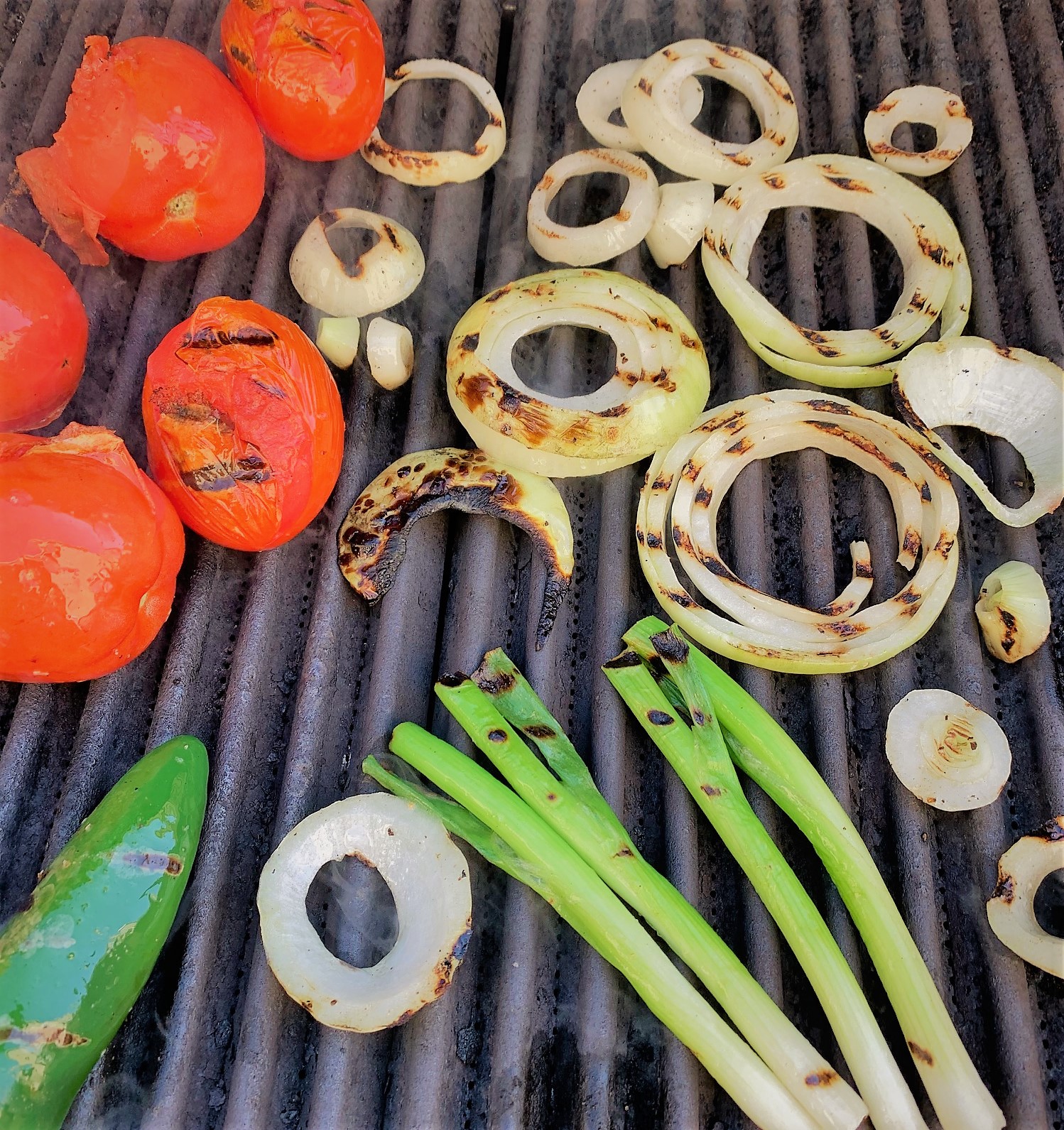 Grilling the vegetables for our Fire Roasted Tomato Salsa