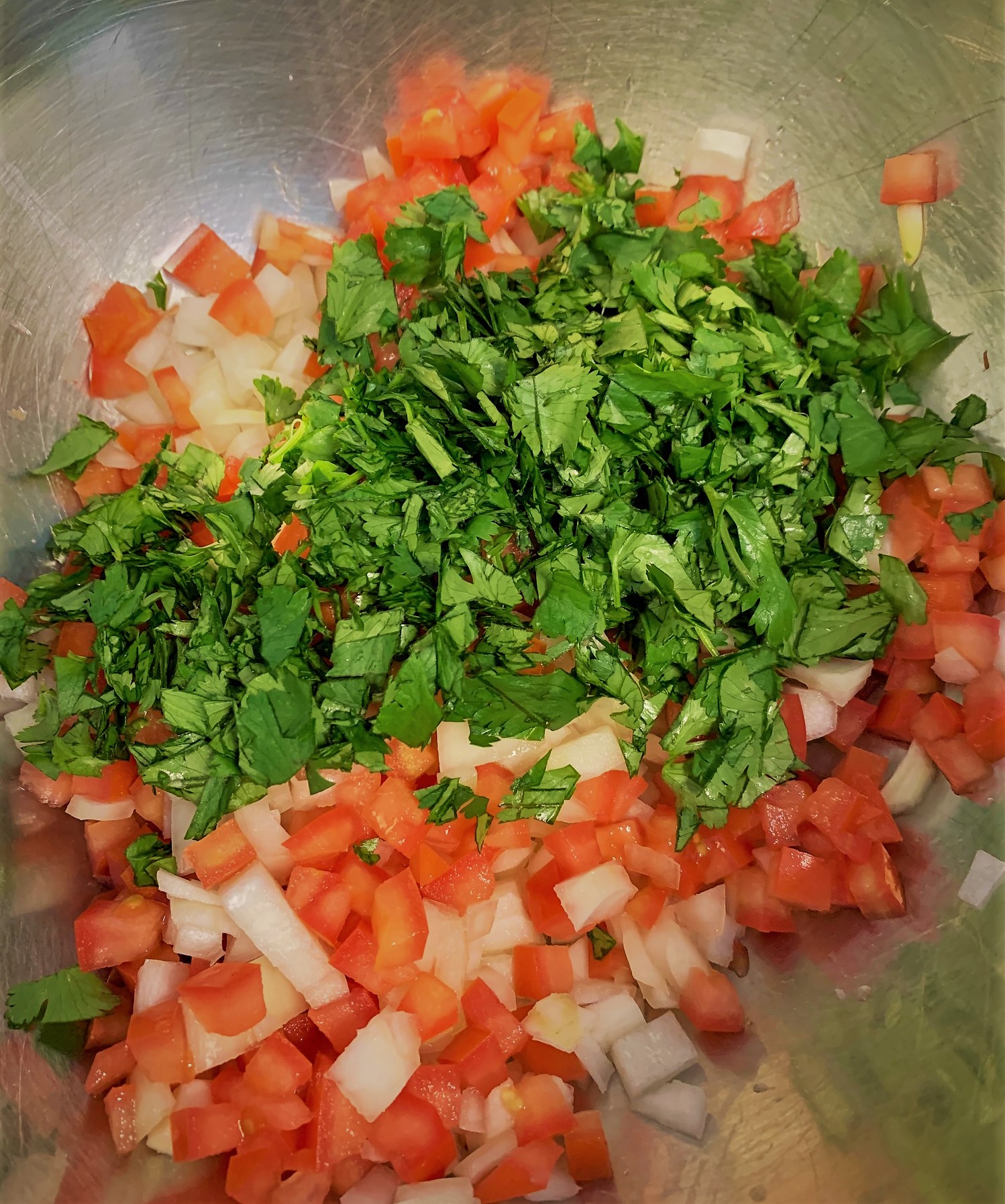 The diced, Tomatoes, Onions and Cilantro for our Traditional Guacamole