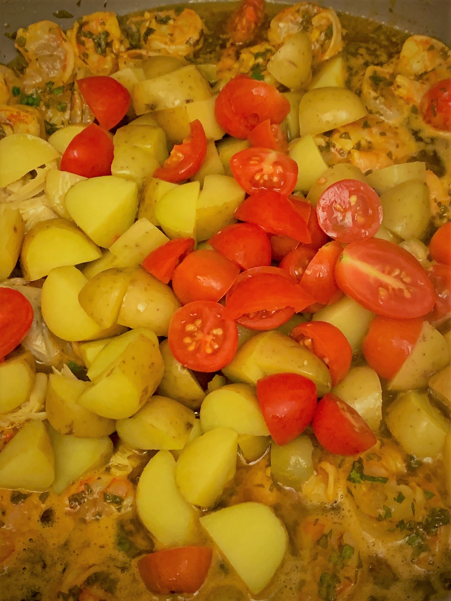 Adding the Vegetables to our Shrimp Chermoula Tangine from Restaurant Marrakesh