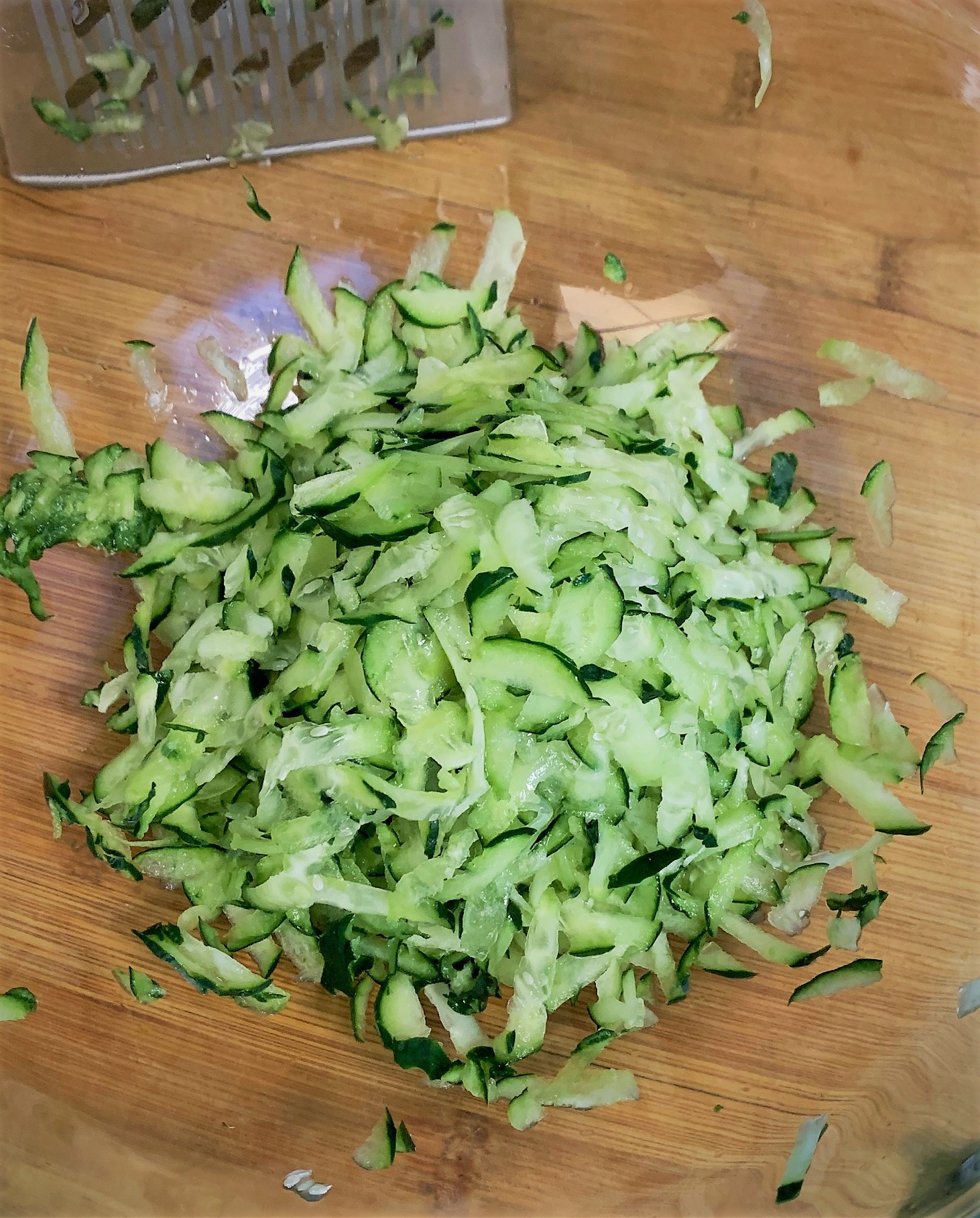 Shredded Cucumber for our Creamy Peppercorn Sauce