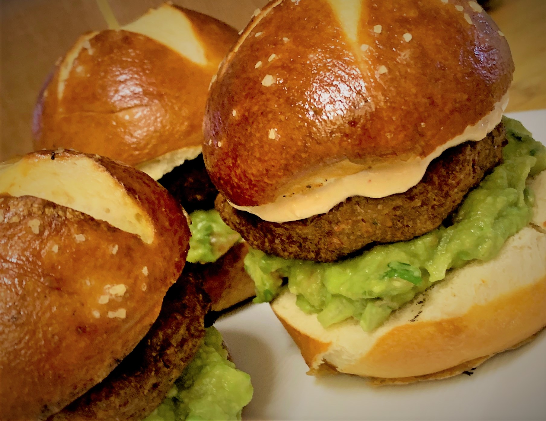 Our assembled Petite Plant-Based Burgers with Guacamole