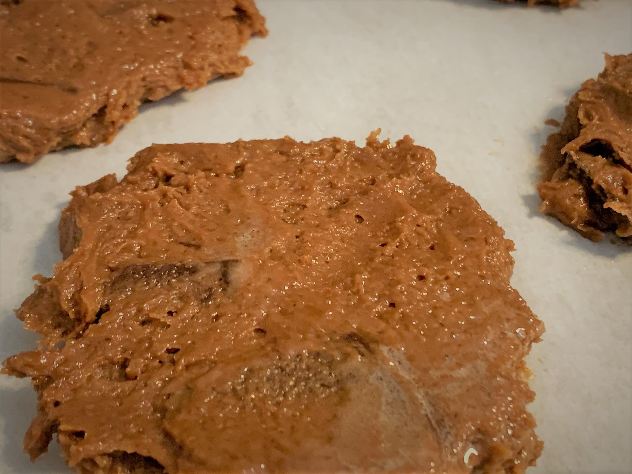 The spooned and pressed dough for our Double Chocolate Chunk Cookies from Main Street Bakery