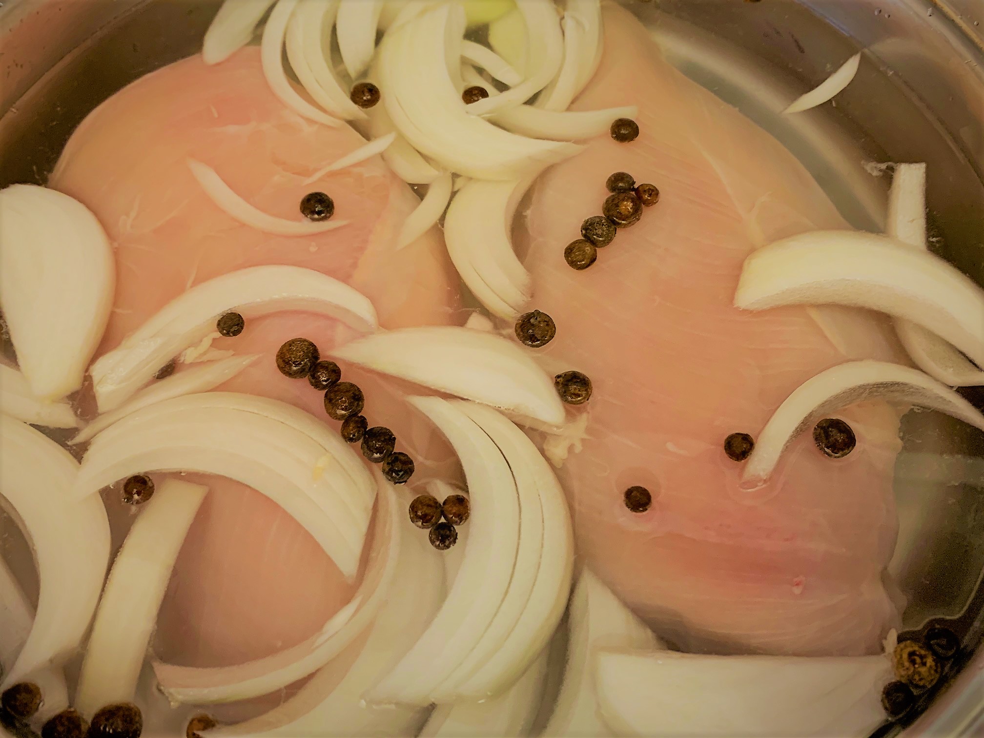 Our Chicken in the pot ready to boil