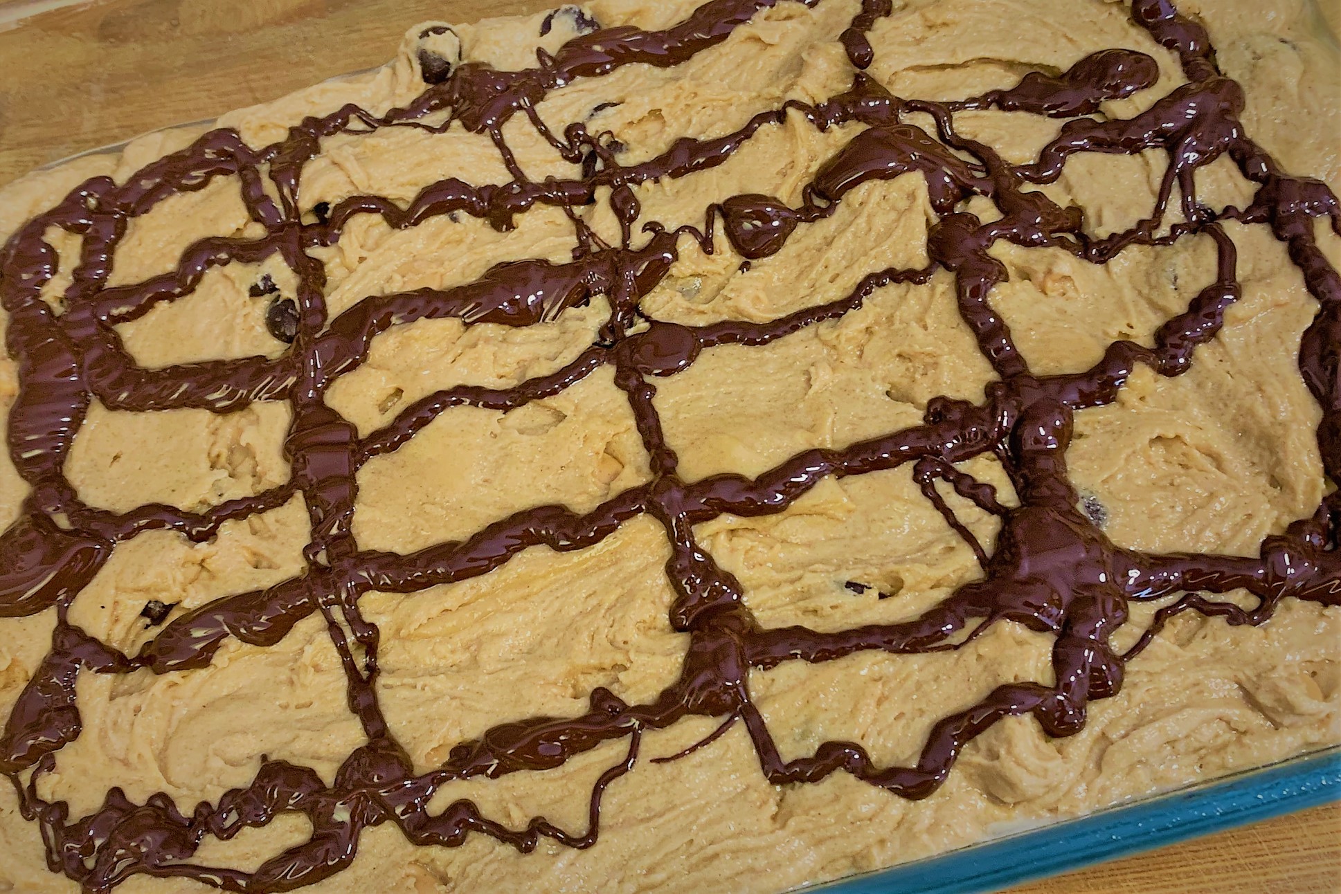 Melted Chocolate drizzled across the top of the Batter