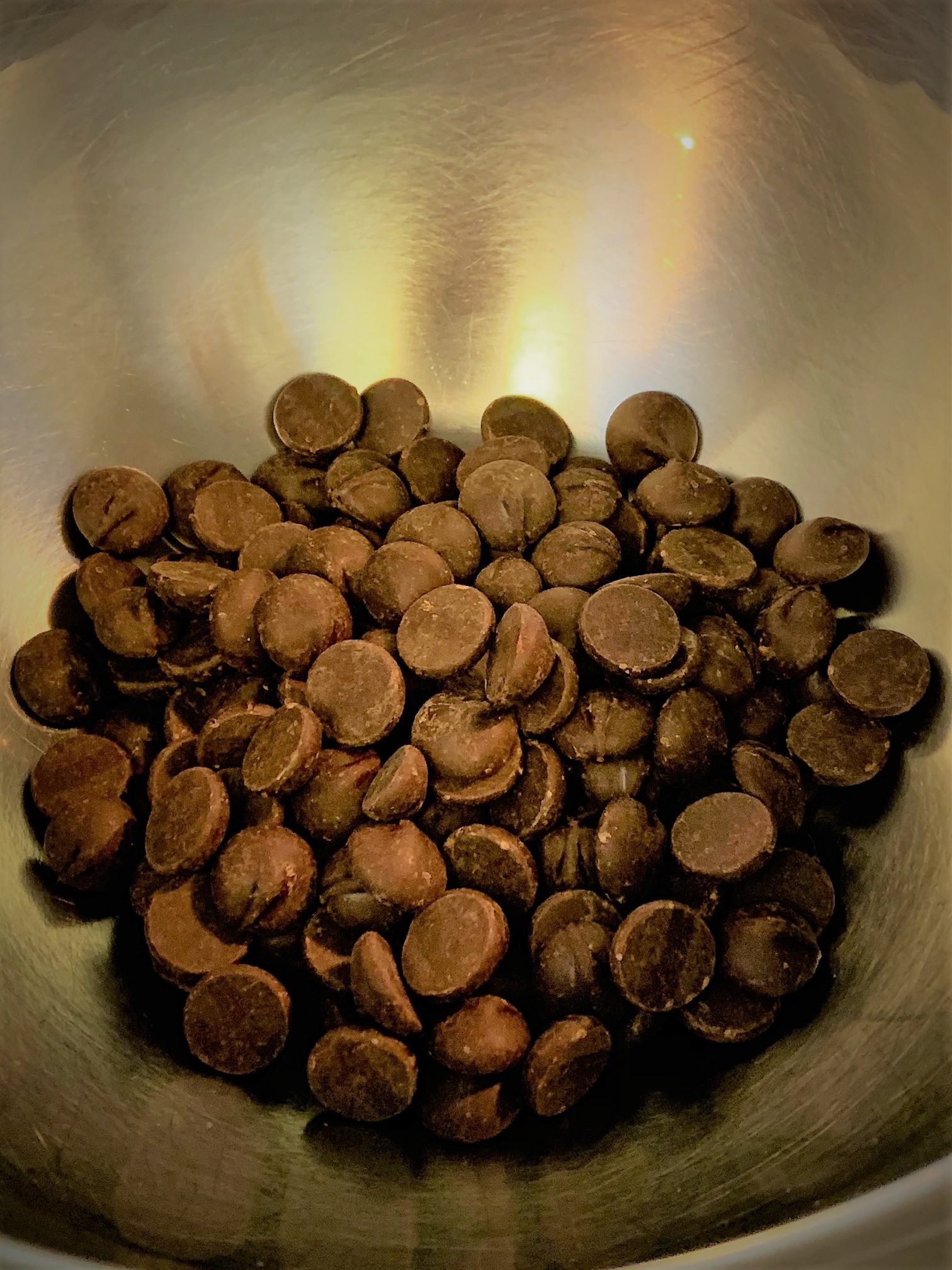 Melting the Chocolate Chips for the topping of our Peanut Butter Cup Cake Bars