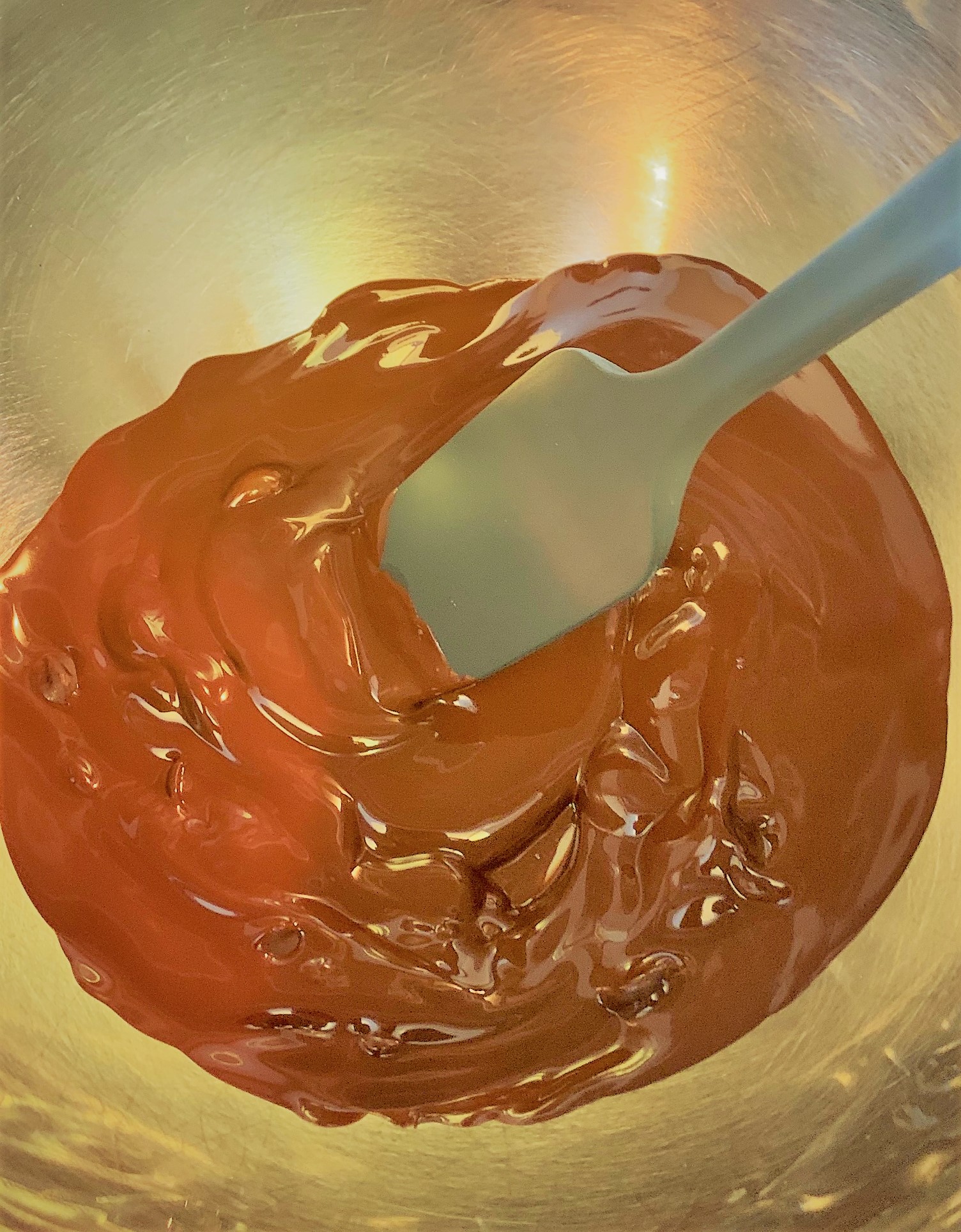 The melted Chocolate for our Peanut Butter Cup Cake Bars 