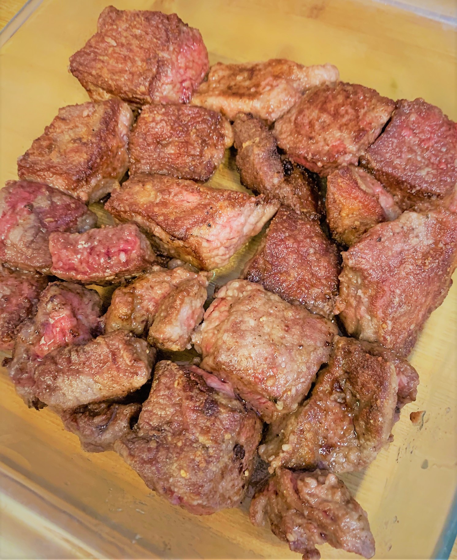 Our Short Ribs added to a pan after searing