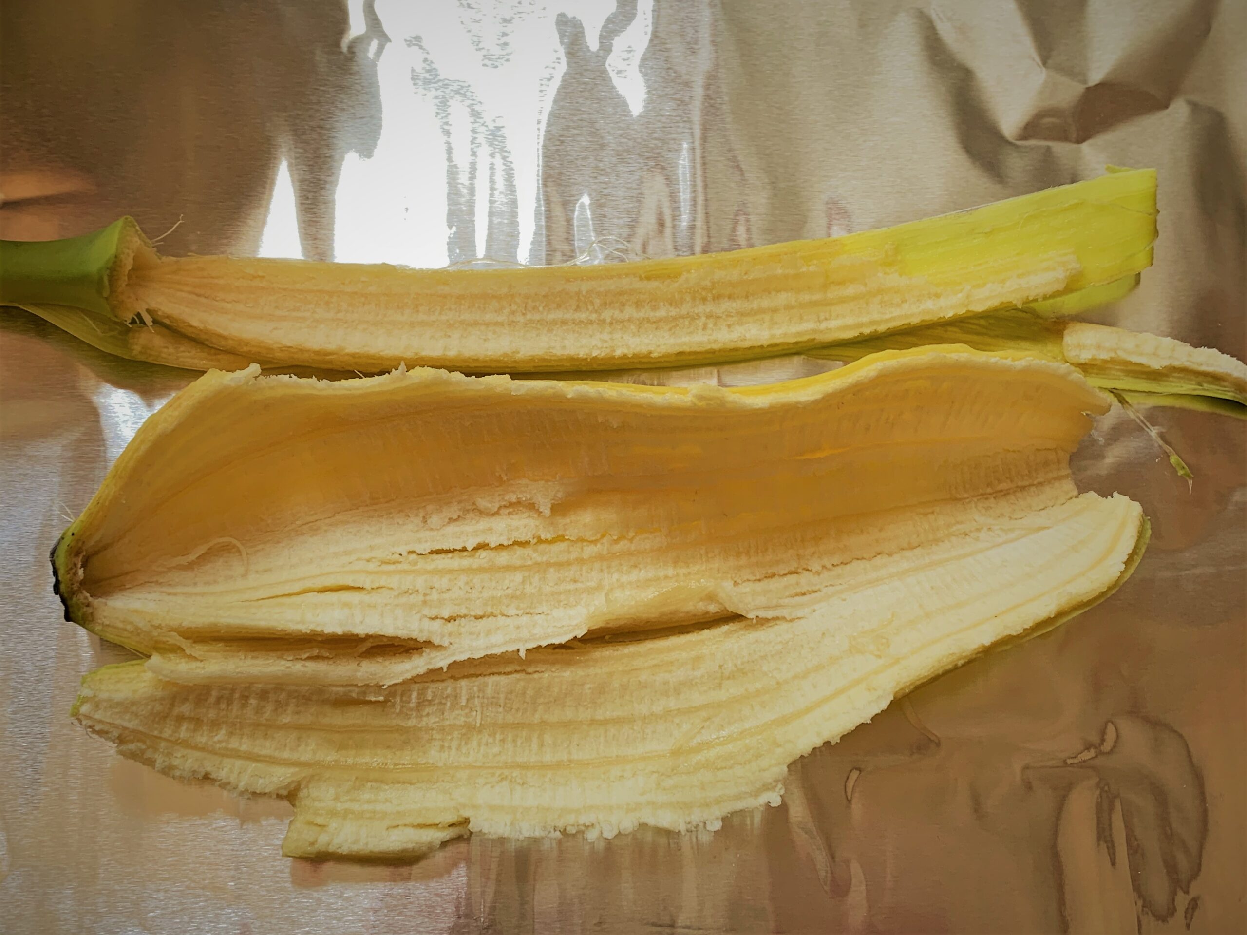 Adding a Banana Peel to our Kalua-Style Pulled Pork roasting wrap