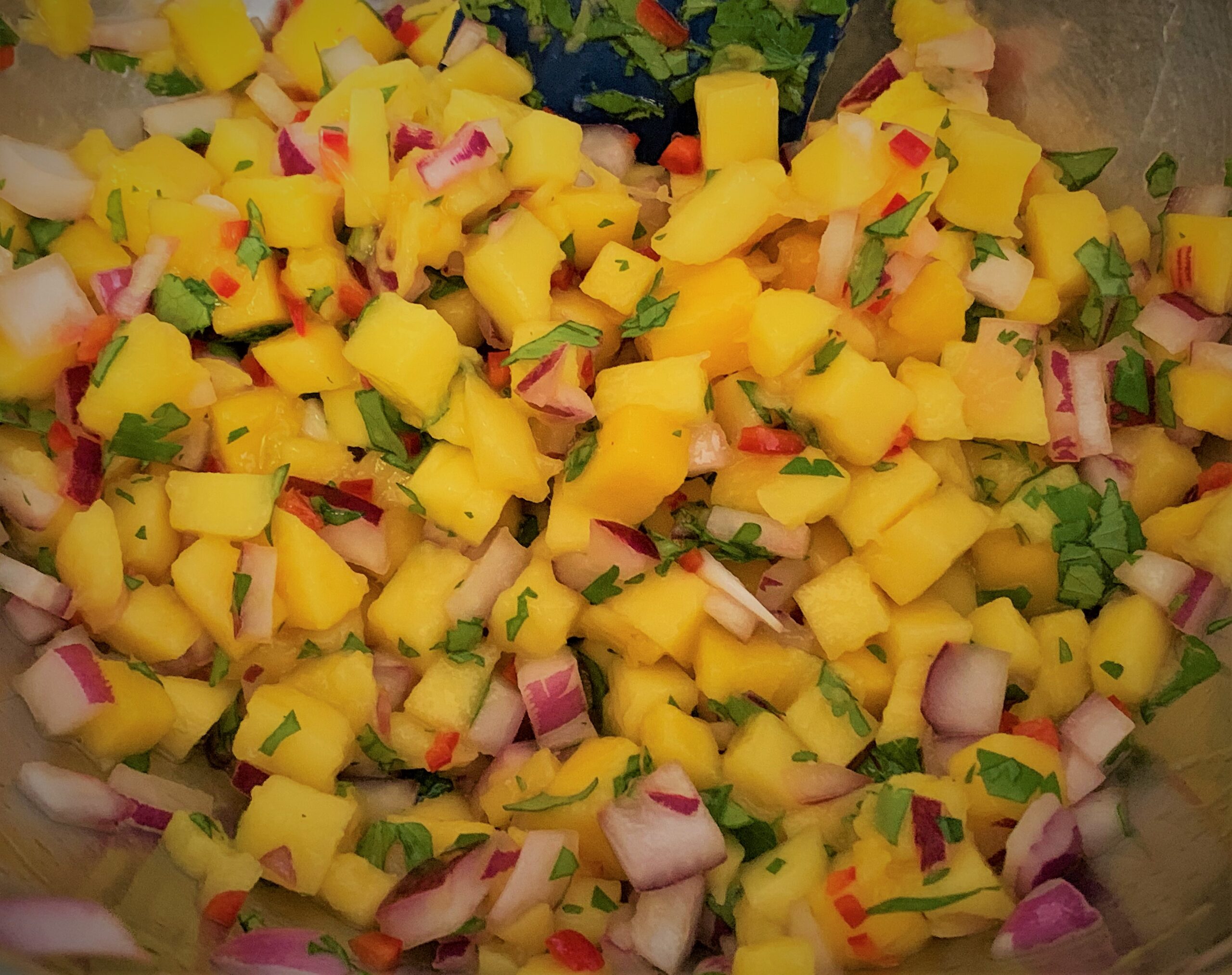 Our combined Mango Salsa for our Kalua-Style Pulled Pork Tots with Polynesian BBQ Sauce & Mango Salsa