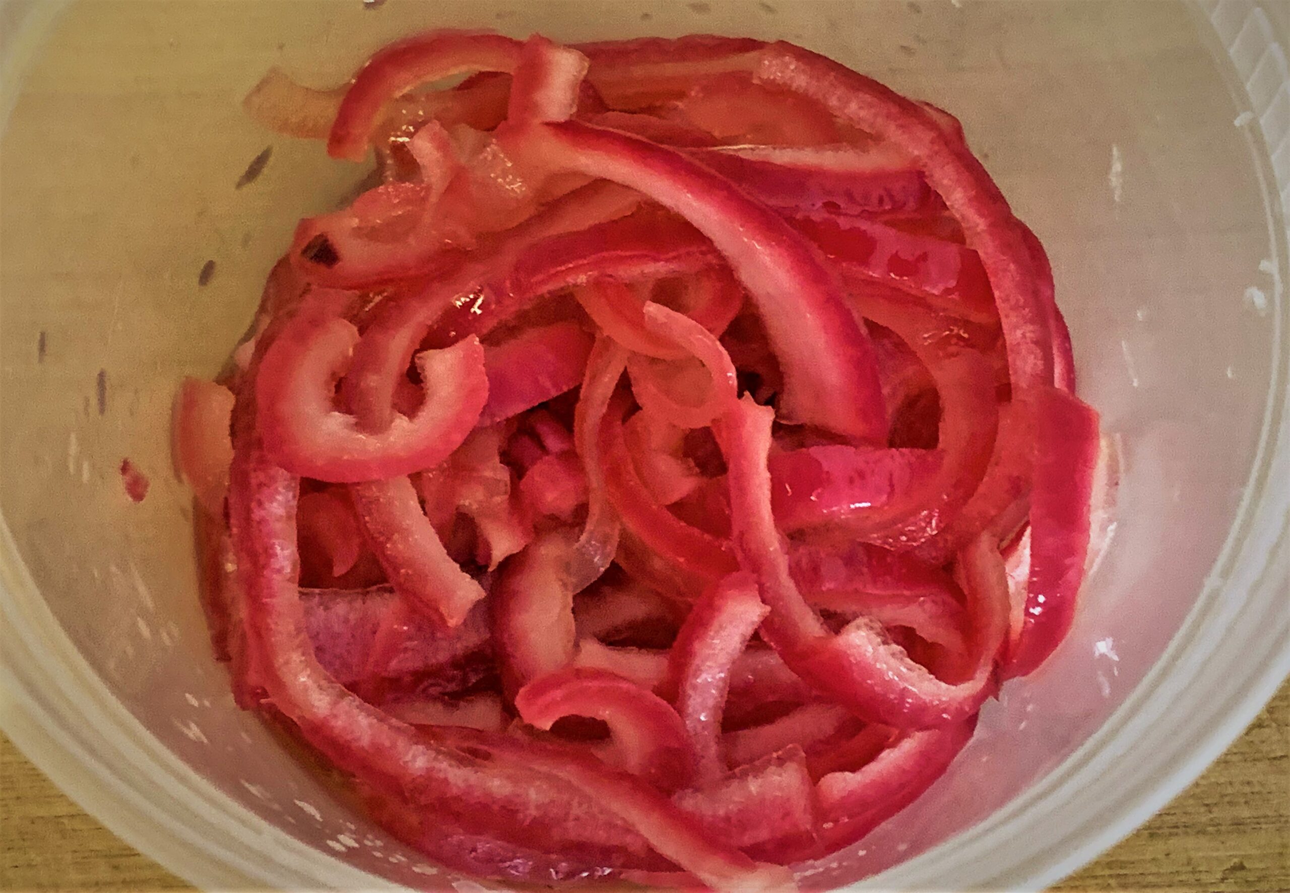 Our Pickeled Red Onions for our Kalua-Style Pulled Pork Tots with Polynesian BBQ Sauce & Mango Salsa