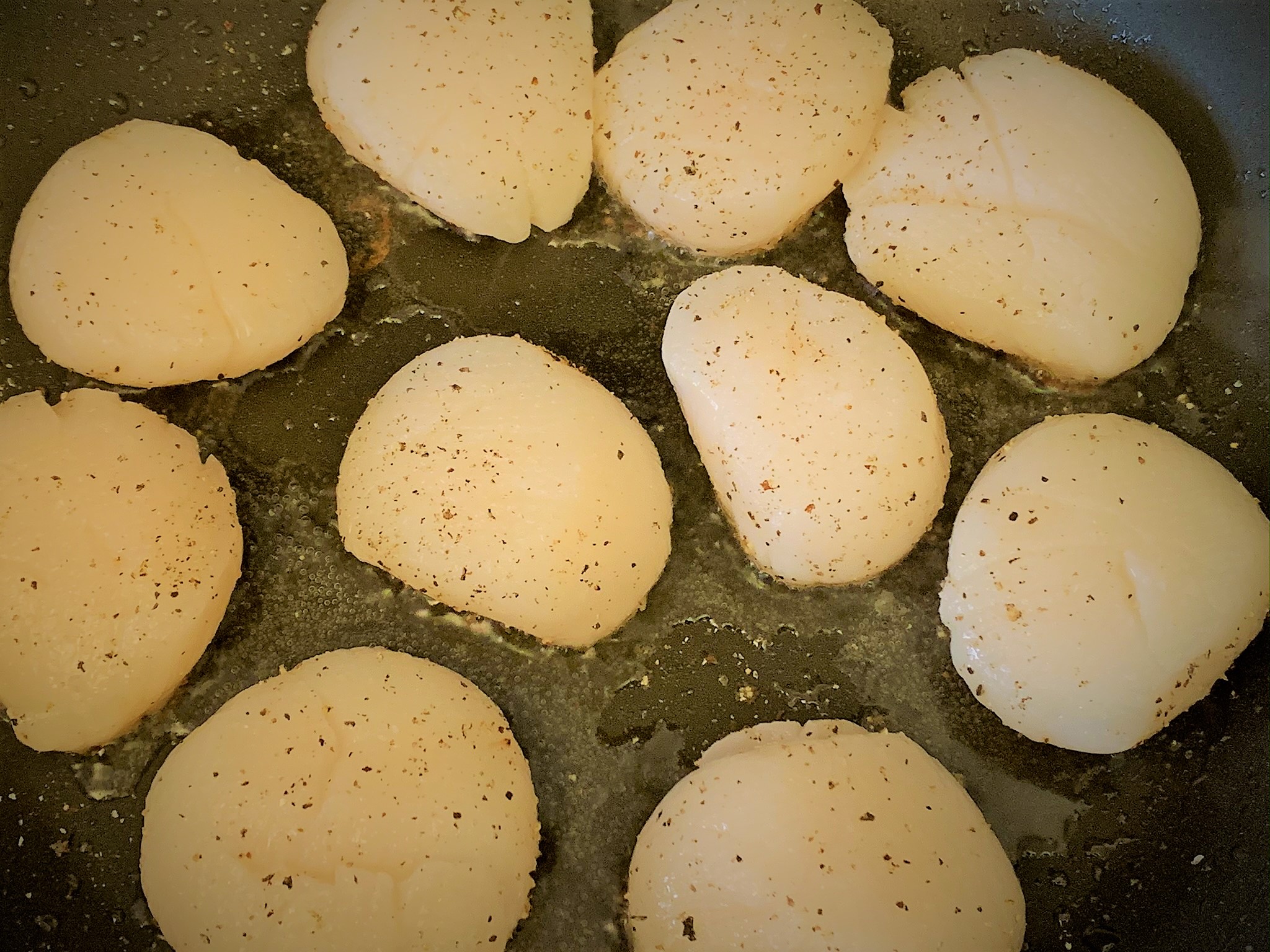 Our Scallops searing away in the pan 