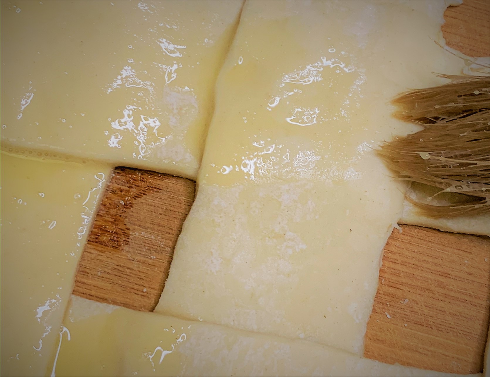 Brushing Egg Wash on the Puff Pastry Topping for our Guinness Braised Short Rib Pot Pie