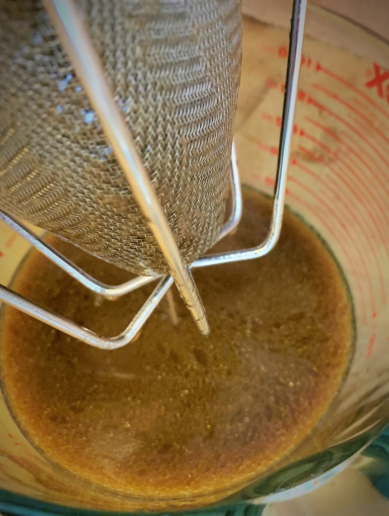 Straining the Braising Liquid for our Guinness Braised Short Rib Pot Pie