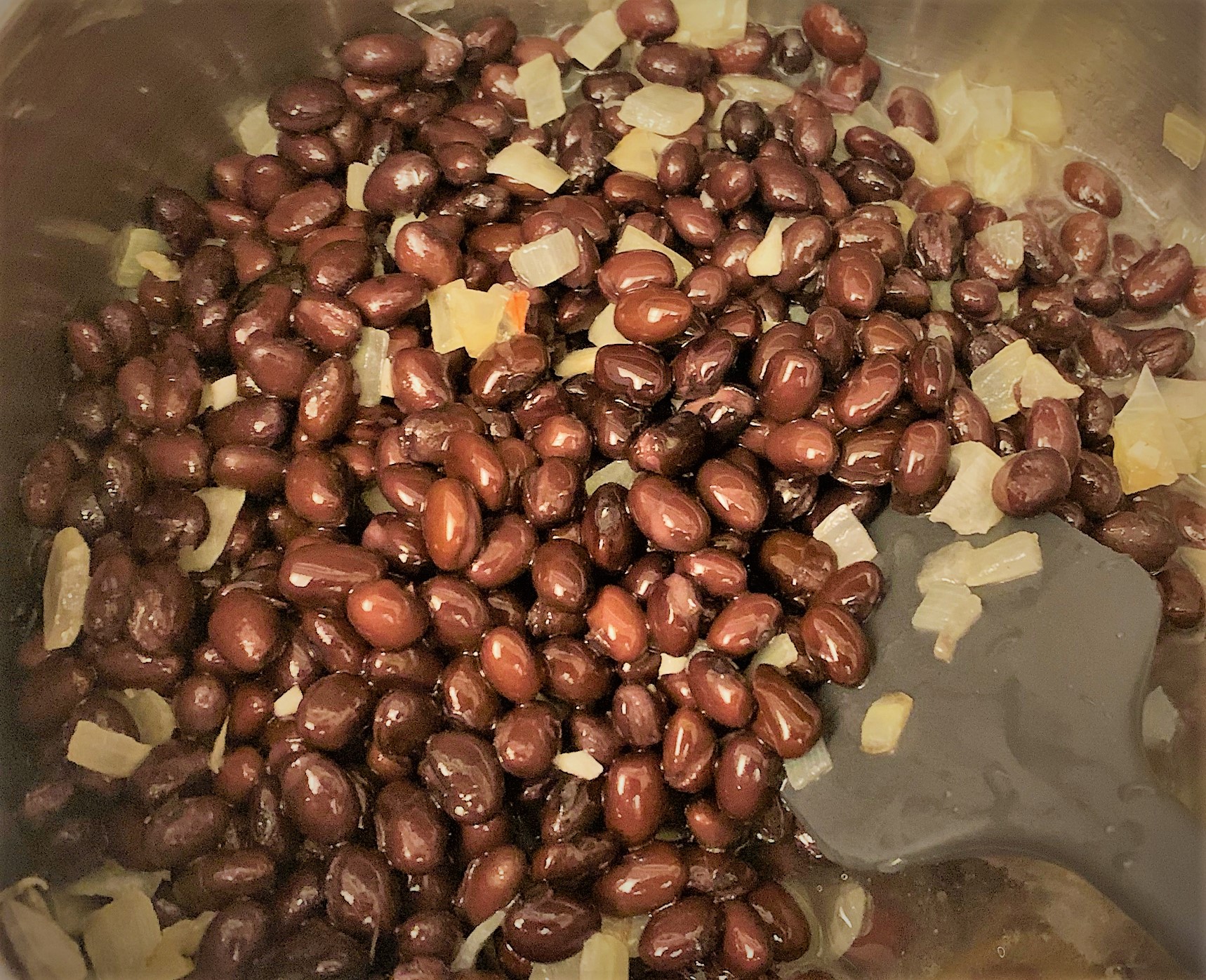 Cooking the Black Beans for our Tostada de Chorizo from Las Posadas Holiday Kitchen