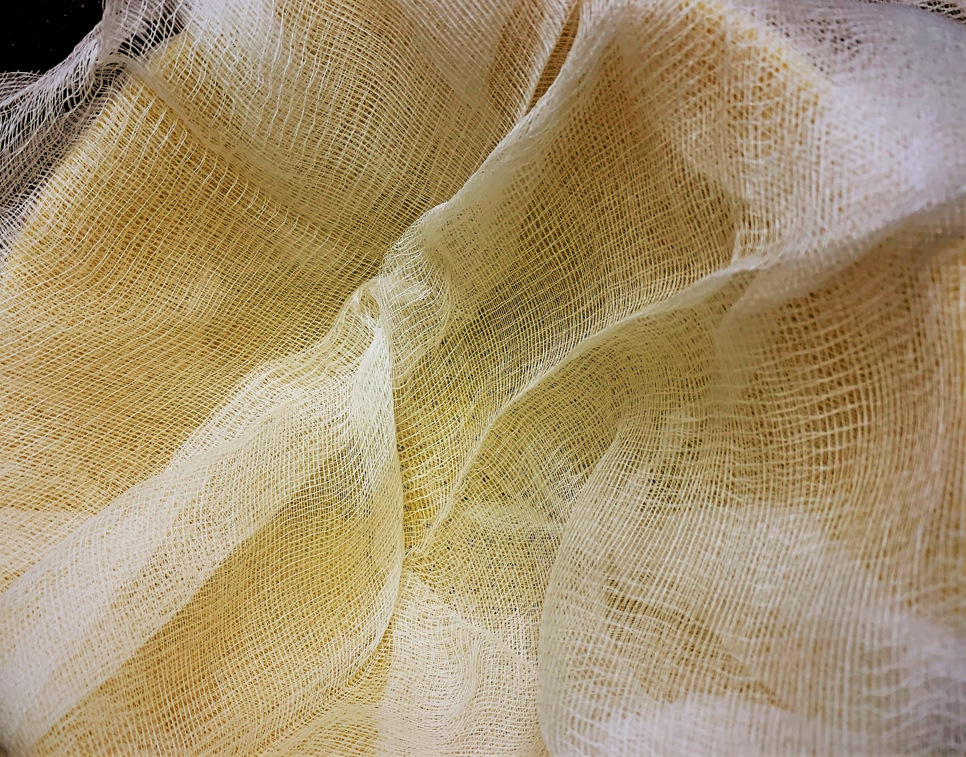 Layers of Cheese Cloth for our shredded Potatoes and Onions