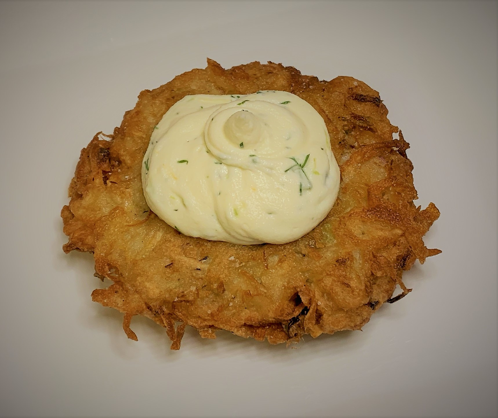 Adding the Citrus-Herb Cream Cheese to the Potato Latkes - Smoked Salmon Potato Latkes