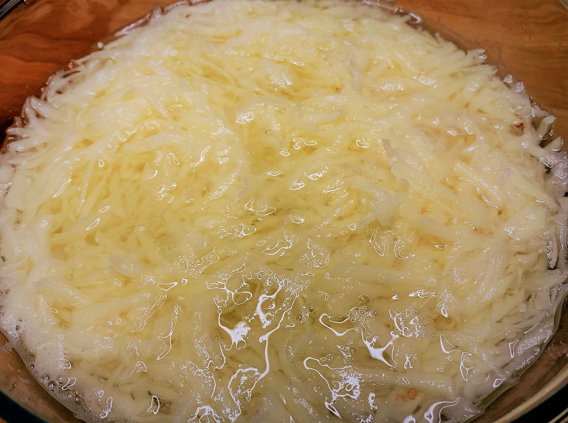 Our shredded Potatoes in water to keep them from oxidizing