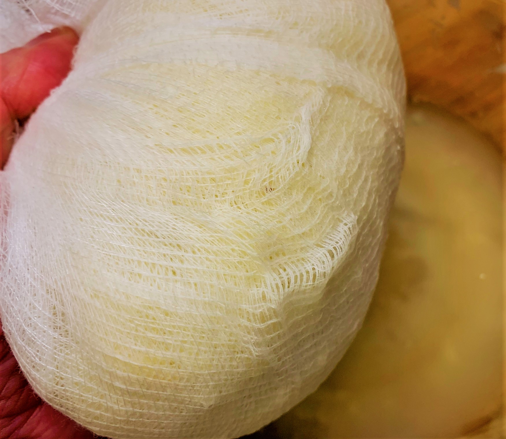 Squeezing the excess moisture from the Potatoes for our Smoked Salmon Potato Latkes