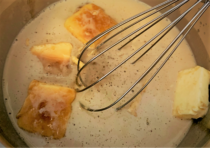 The components for the Caramel sauce in a pot 