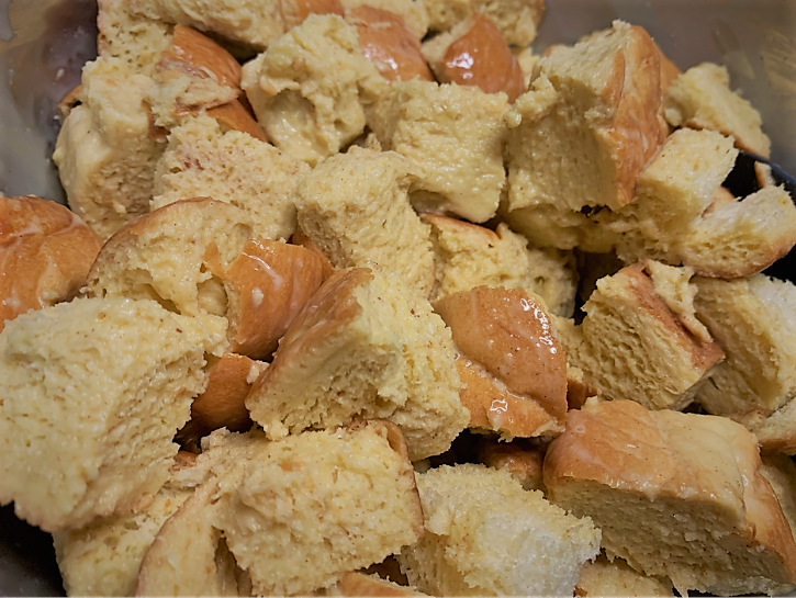 Combining the Cubed Bread with the Egg Mixture