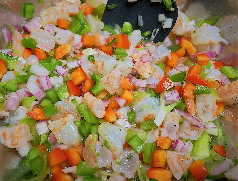 Citrus juices added to the other Ceviche ingredients