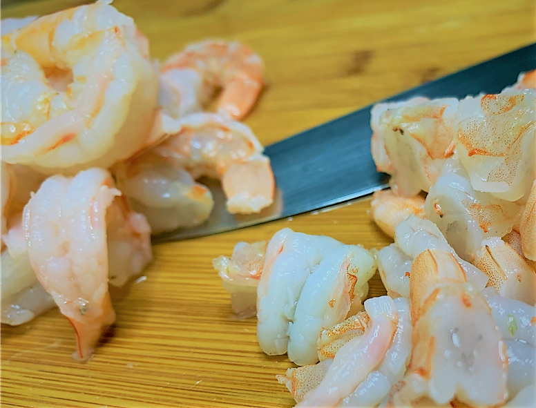 Chopping the cooked Shrimp