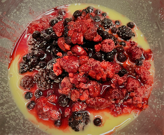 Our Berry Compote components in a bowl ready to be blended - Warm Berry Buckle Recipe