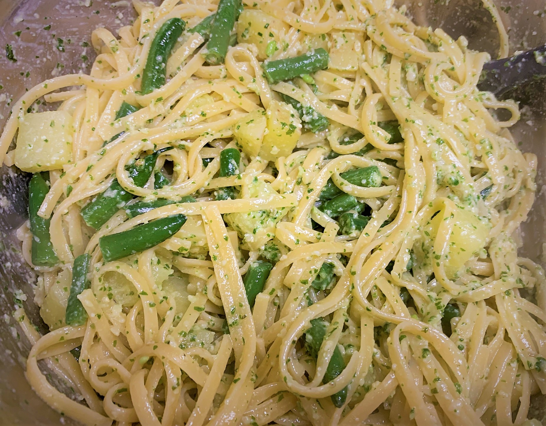 Our cooked Pasta tossed in the Pesto Sauce and ready to serve