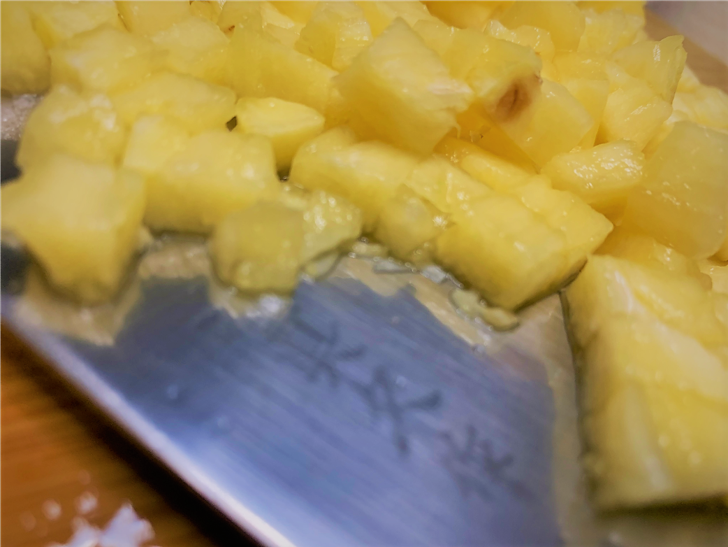 Dicing the Fresh Pineapple for our Pongu Lumpia