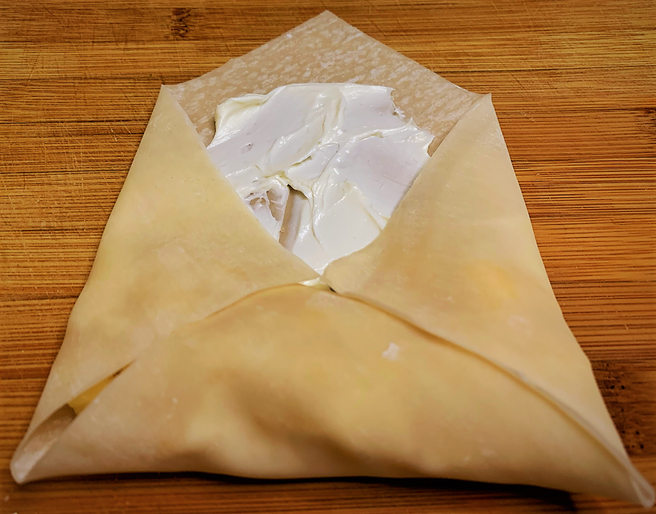 Folding in the sides of the Spring Roll Wrapper 