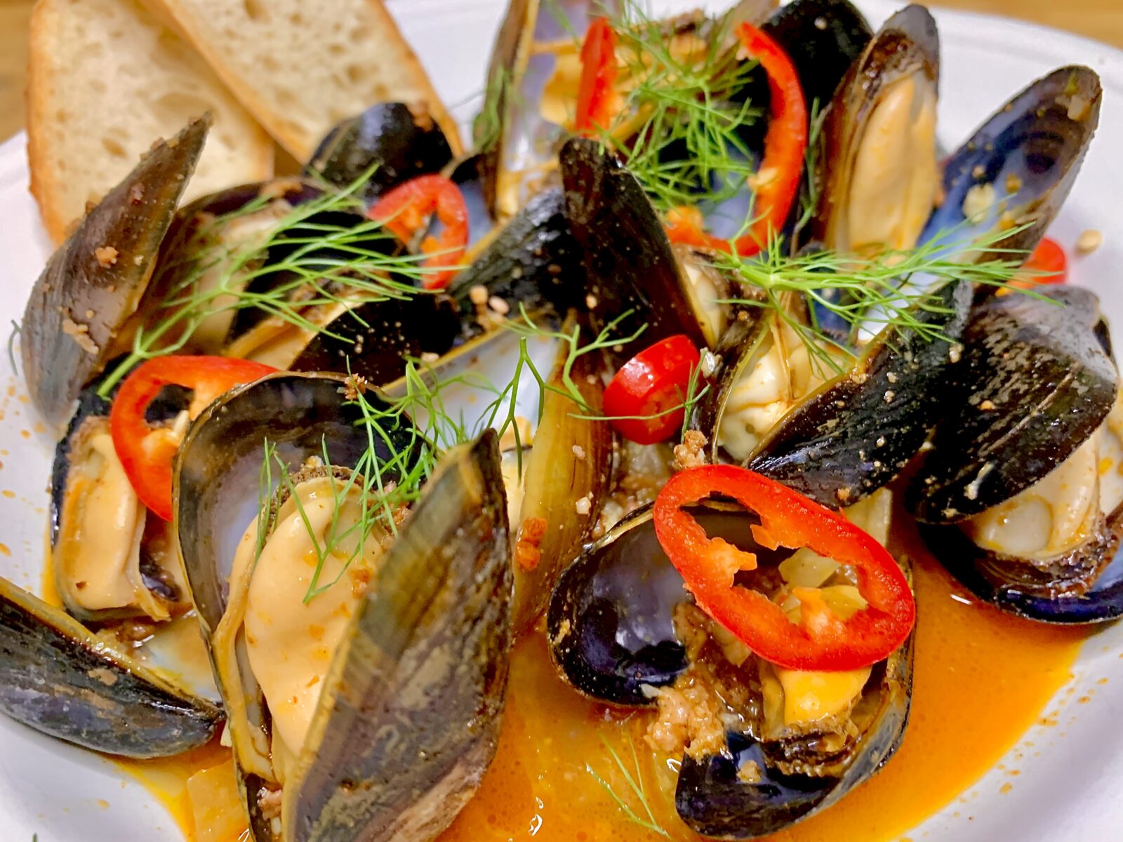 Our plated Disney Dishes New York Cider Braised Mussels from The Turf Club Bar & Grill